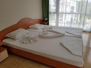 Postel nebo postele na pokoji v ubytování Elit 2 Apartments