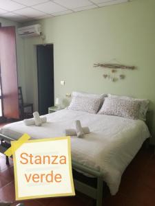 מיטה או מיטות בחדר ב-Agriturismo Boschi