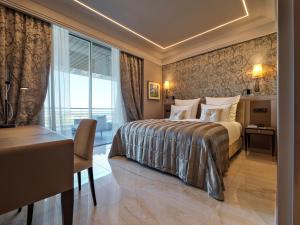 Posteľ alebo postele v izbe v ubytovaní Alàbriga Hotel GL