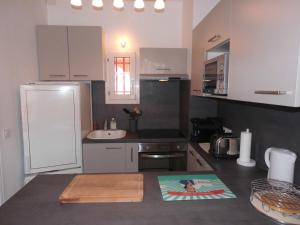 Køkken eller tekøkken på Rue de Corfou Les Grenadines + 6 billeder