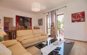 a living room with a couch and a table at GAETA - Villa Fontania in Gaeta