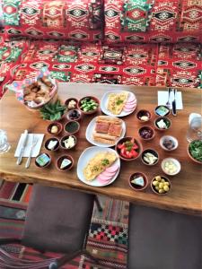 a table with plates of food on it at Kapadokya Konak in Uchisar