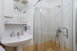Koupelna v ubytování Zanart Maisonette + 21 fotografií