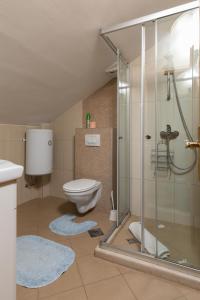 Kúpeľňa v ubytovaní Apartments Bozica