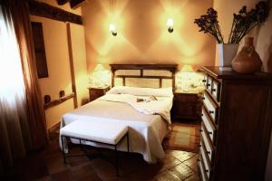 Säng eller sängar i ett rum på Casona de Espirdo