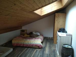 Un pat sau paturi într-o cameră la Le Nant