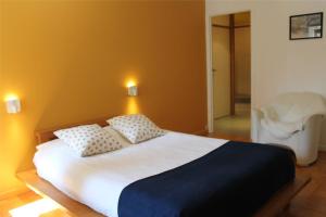 Postel nebo postele na pokoji v ubytování Guesthouse Legrand