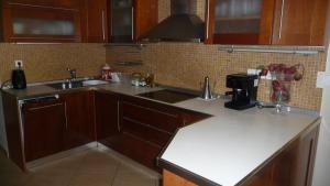 Kuchyň nebo kuchyňský kout v ubytování Comfy Apartment + 24 fotografií
