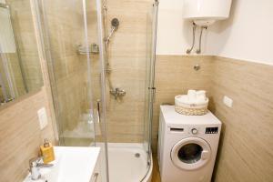 Kúpeľňa v ubytovaní Luxury Apartment Nuneni