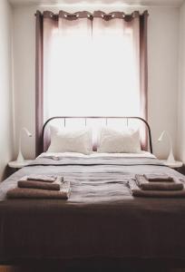 Postel nebo postele na pokoji v ubytování Apartament w centrum Olsztyna - Grunwaldzka