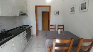 Kuchyňa alebo kuchynka v ubytovaní Apartments Vlasici
