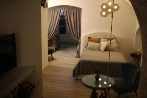 Llit o llits en una habitació de Piervì Suite
