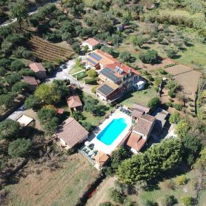 an aerial view of a house with a swimming pool at Agriturismo San Giorgio in Casal Velino