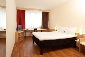 Postel nebo postele na pokoji v ubytování Ibis Budapest City