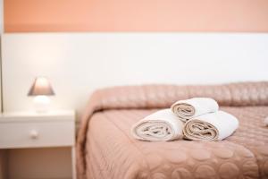 Postel nebo postele na pokoji v ubytování B&B Siracusa Holidays