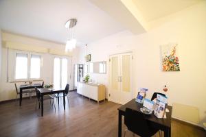 TV a/nebo společenská místnost v ubytování B&B Siracusa Holidays