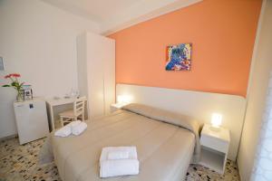 Postel nebo postele na pokoji v ubytování B&B Siracusa Holidays
