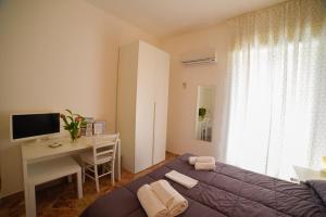 Postel nebo postele na pokoji v ubytování B&B Siracusa Holidays