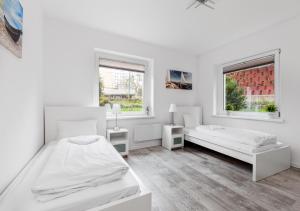 Posteľ alebo postele v izbe v ubytovaní Apartament przy Bulwarze