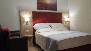 Postel nebo postele na pokoji v ubytování B&B Vanessa