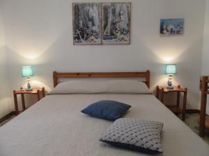 Postel nebo postele na pokoji v ubytování Villa Oltremare By Cala Salento