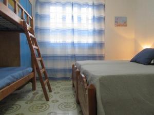 Postel nebo postele na pokoji v ubytování Villa Oltremare By Cala Salento