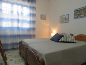 Postel nebo postele na pokoji v ubytování Villa Oltremare By Cala Salento