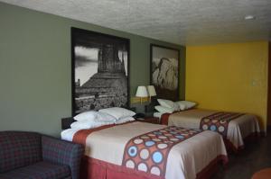 Voodi või voodid majutusasutuse Super 8 by Wyndham St. George UT toas