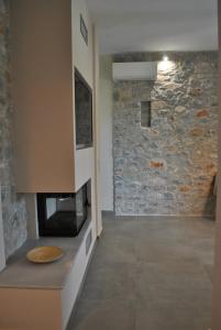 Kuchyň nebo kuchyňský kout v ubytování Petras Gi - Stone Houses