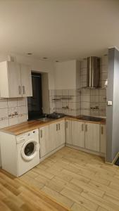 Kuchyňa alebo kuchynka v ubytovaní Nowy apartament Bydgoszcz centrum