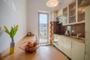 Kuchyňa alebo kuchynka v ubytovaní Kierunek Sopot Apartament GRACJA Monte Cassino 36