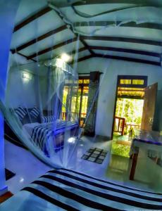 Bazén v ubytování Cozy Homestay Waterfall Road Ella nebo v jeho okolí