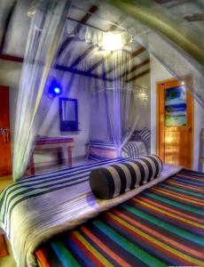 Postel nebo postele na pokoji v ubytování Cozy Homestay Waterfall Road Ella