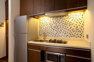 Η κουζίνα ή μικρή κουζίνα στο Saigon City Residence +10 φωτογραφίες