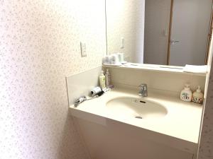 Um banheiro em Toya Kanko Hotel
