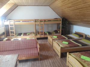 Postel nebo postele na pokoji v ubytování Penzion Květná Zahrada