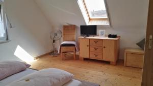 En eller flere senger på et rom på Haus Liebevoll in Wald 102