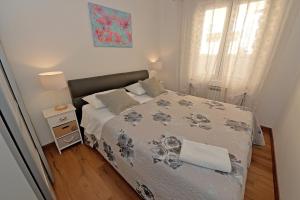 Postel nebo postele na pokoji v ubytování Apartment Simoni ZD