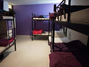 Letto o letti in una camera di Joey's Hostel Agra - 200m from Taj Mahal