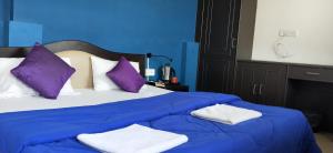 Letto o letti in una camera di Joey's Hostel Agra - 200m from Taj Mahal