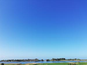 a view of a river with a blue sky at Casa Noemi in Sperlonga