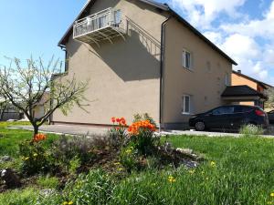 Zahrada ubytování Apartment and Rooms Aračić