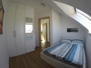 Postel nebo postele na pokoji v ubytování Ferienhaus Talblick