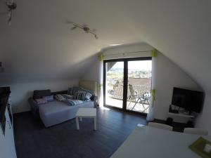 TV a/nebo společenská místnost v ubytování Ferienhaus Talblick