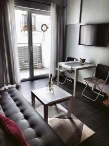 Posedenie v ubytovaní Apartament Orchidea New Slavia