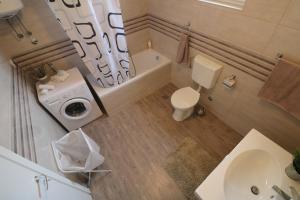 Kúpeľňa v ubytovaní Apartman La maison