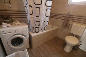 Kúpeľňa v ubytovaní Apartman La maison