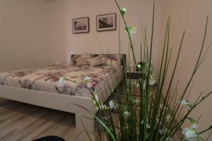 Posteľ alebo postele v izbe v ubytovaní Apartman La maison