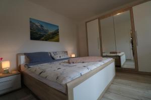 Posteľ alebo postele v izbe v ubytovaní Apartman La maison