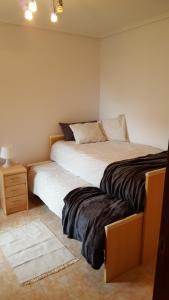 Ένα ή περισσότερα κρεβάτια σε δωμάτιο στο Apartamento Turístico Los Altos +14 φωτογραφίες